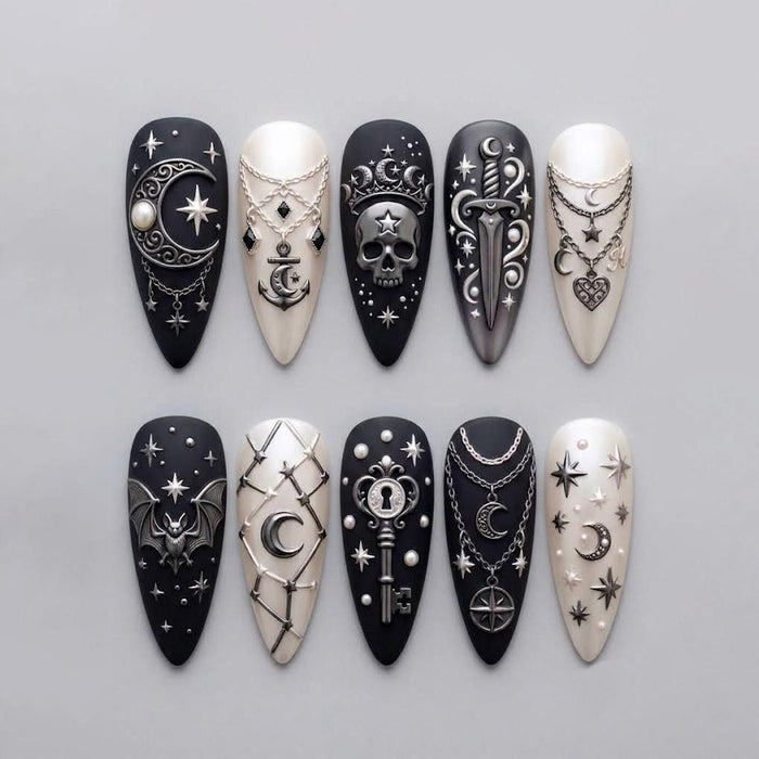 Black and Ivory Celestial Gothic Press-On Nails with Silver Moons, Stars and Charms