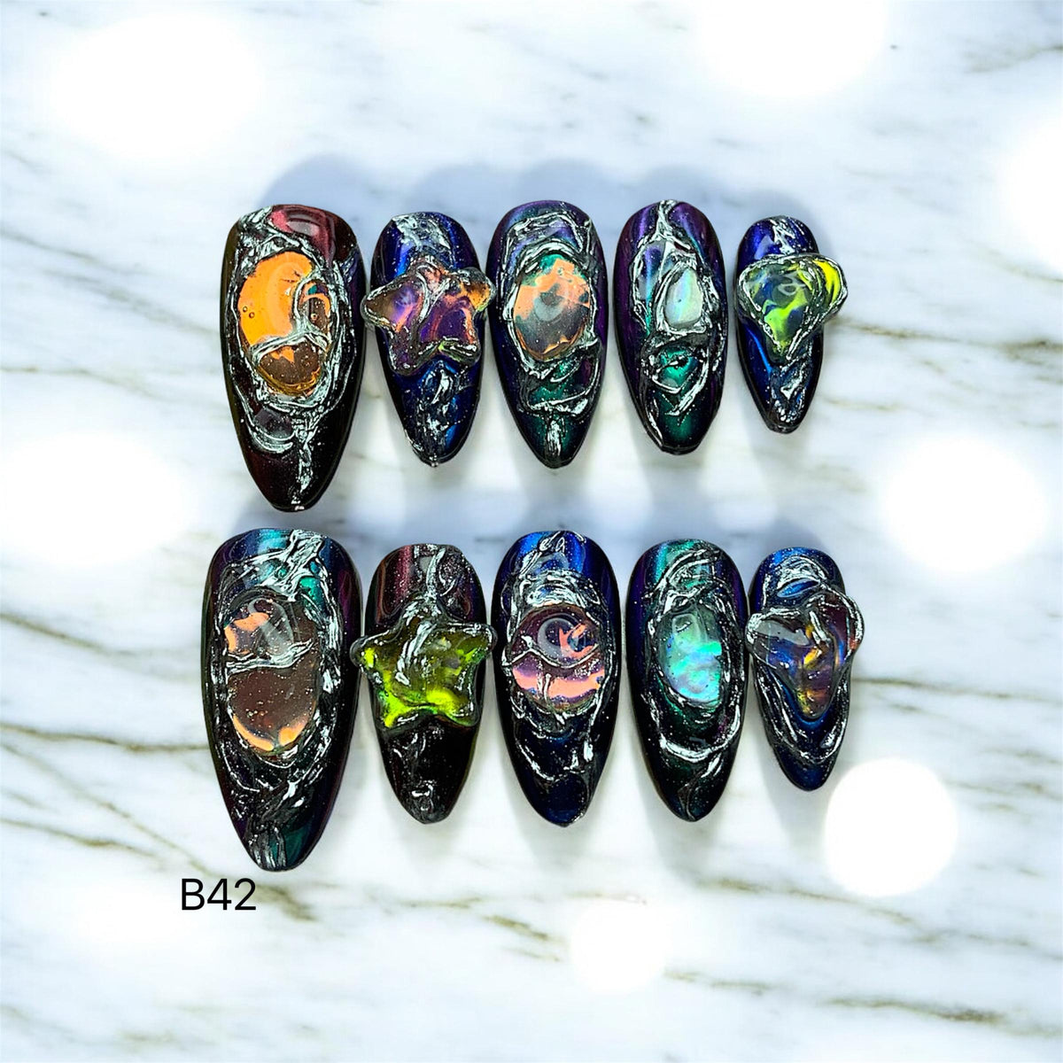 Black and Navy Cyber Nails with Iridescent Swirls and Raised Star Details