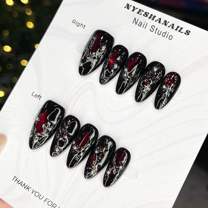 Black and Red Cat Eye Press On Nails with Silver Molten Veining and Cross Accents