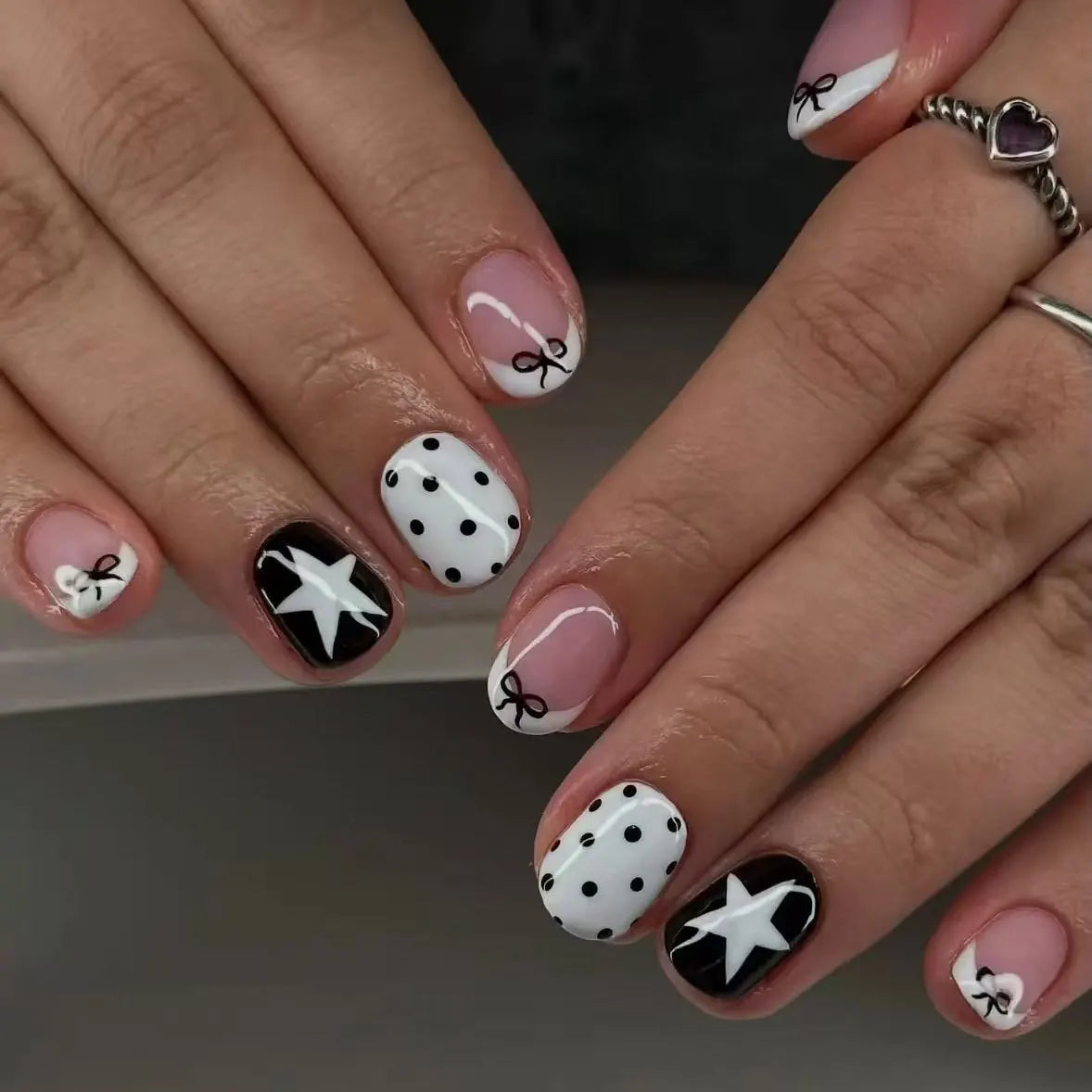Black and White French Tip Nails with Bows, Polka Dots, and Stars
