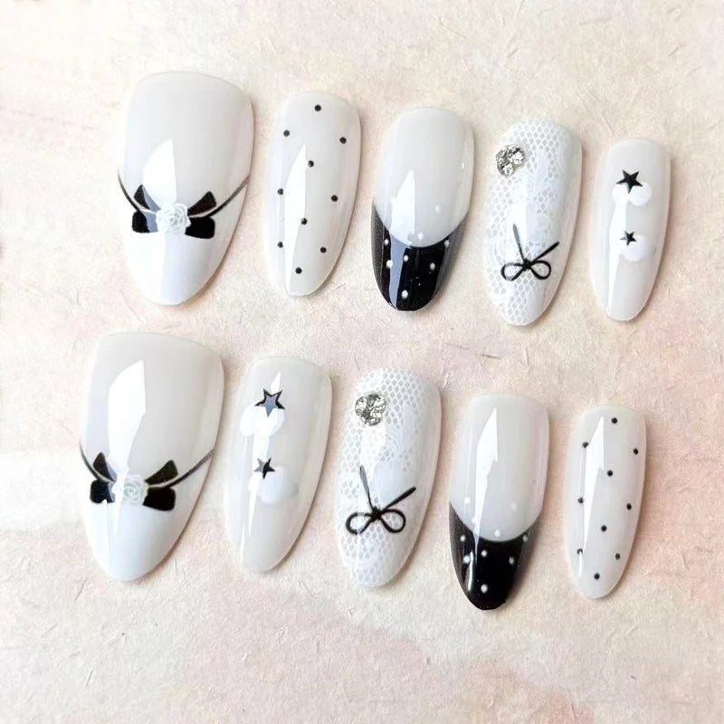 Black and White Polka Dot French Tip Nails with Bows, Stars and Rhinestones