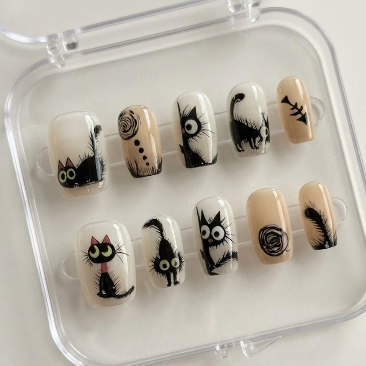 Black Cat Gothic Nail Set With Nude Bases and Hand-Drawn Eyes