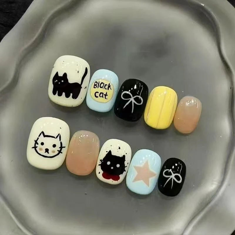 Black Cat Nail Set With Bows, Stars and Pastel Colors