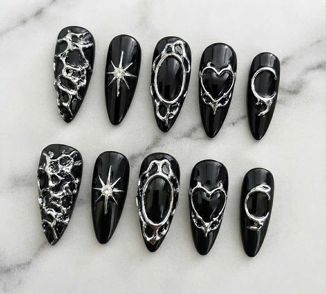 Black Gothic Chrome Nails With Silver Sculptural Hearts, Stars and Celestial Details