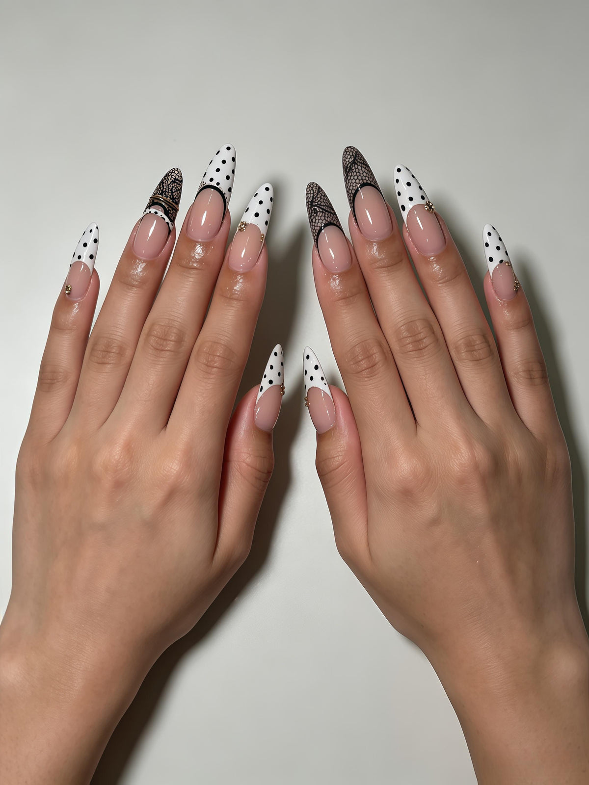 Black Lace and Polka Dot French Tip Press On Nails with Gold Ring Charms
