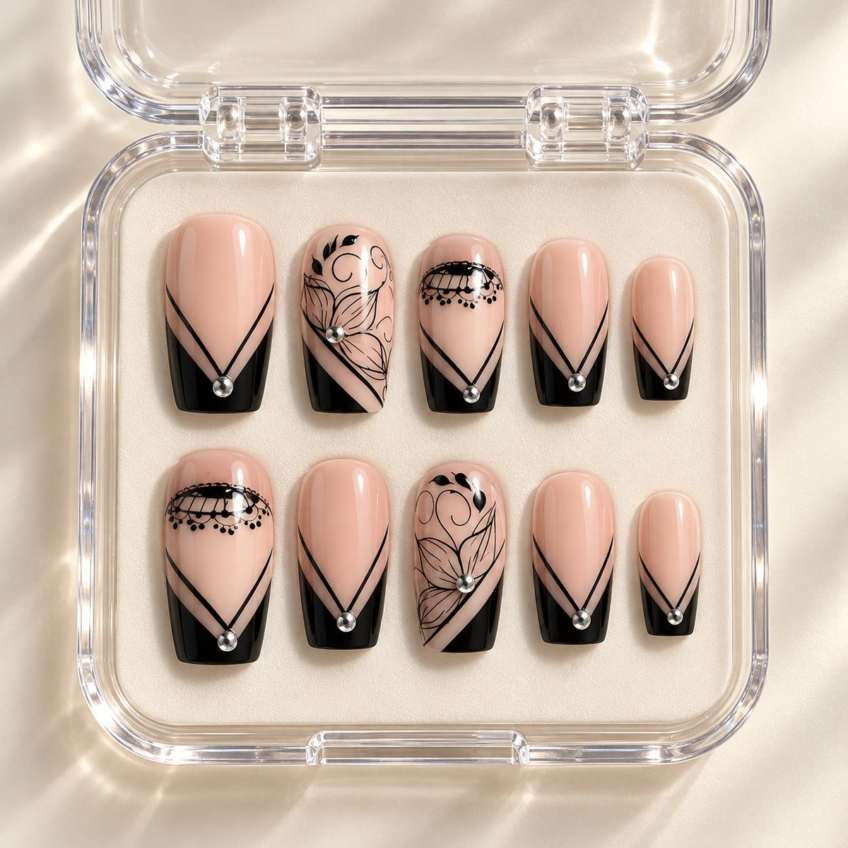 Black Lace Floral French Tip Press On Nails With Silver Rhinestones in clear acrylic storage box
