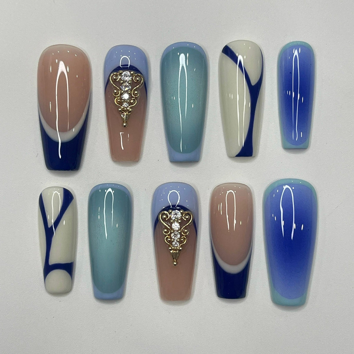 Blue and Taupe Press-On Nails with Gold Embellishments and Rhinestones