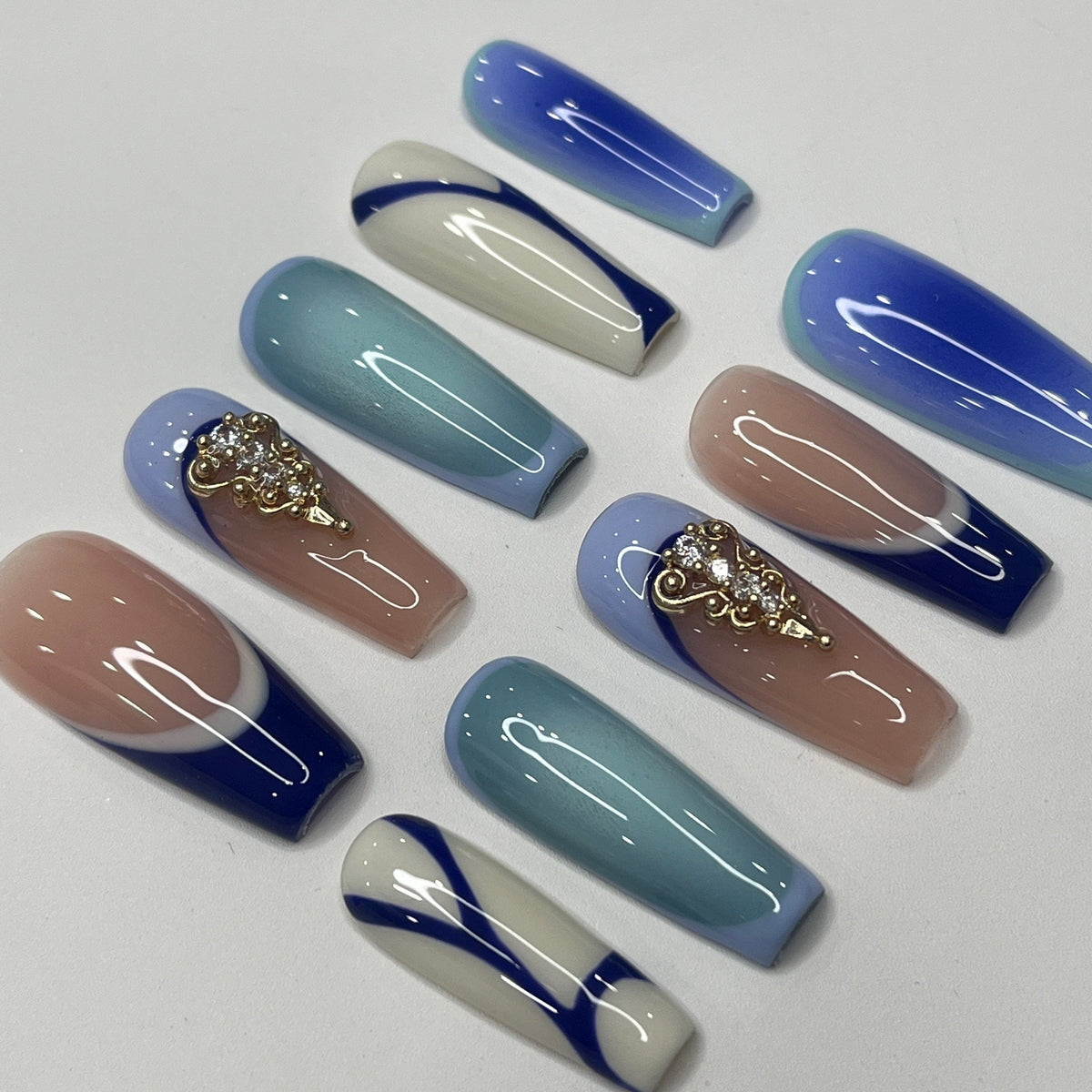 Blue and Taupe Press-On Nails with Gold Embellishments and Rhinestones