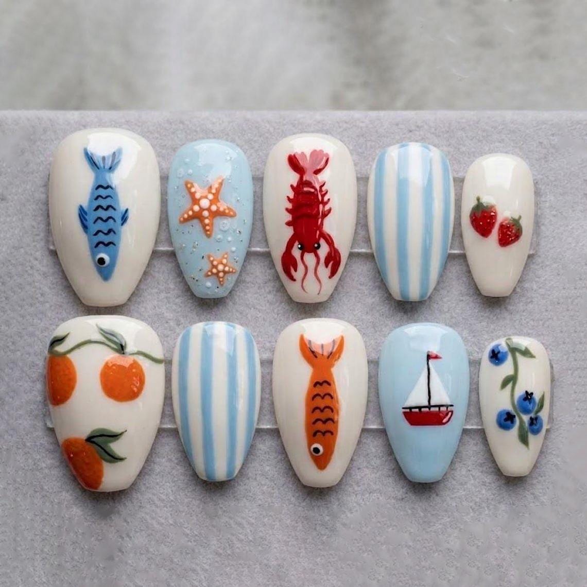 Blue and White Striped Ocean Nails with Fish, Lobster, and Beach Motifs