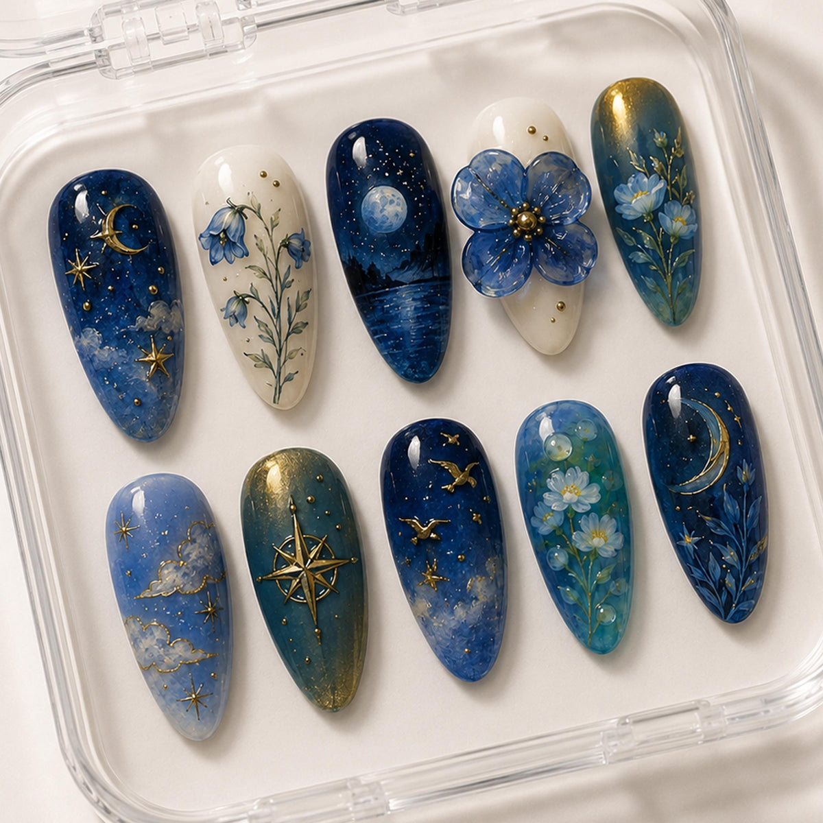 Blue Celestial Floral Press-On Nail Set With Gold Moons, Stars, and Compass
