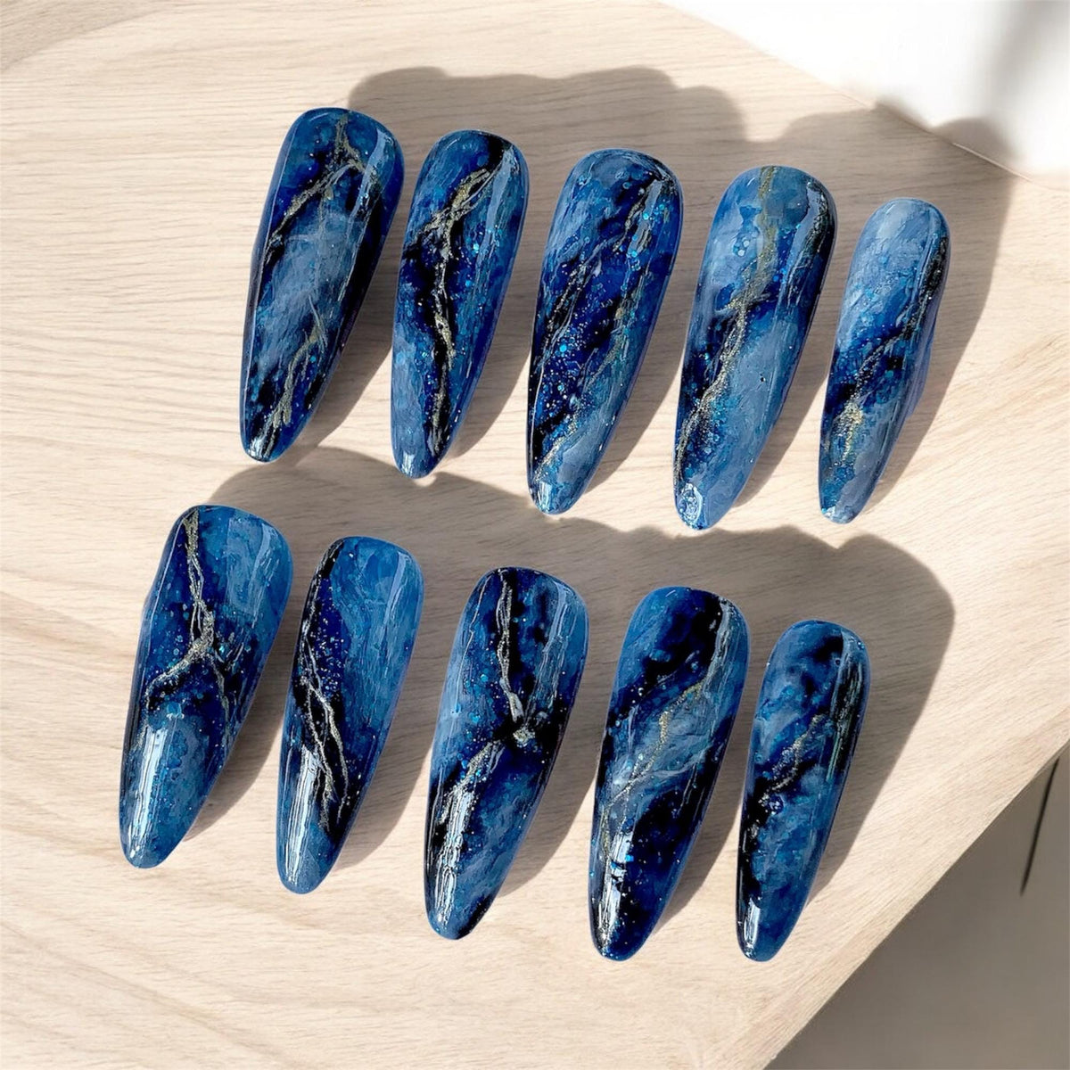 Blue Marble Press-On Nail Set With Silver and Gold Veining