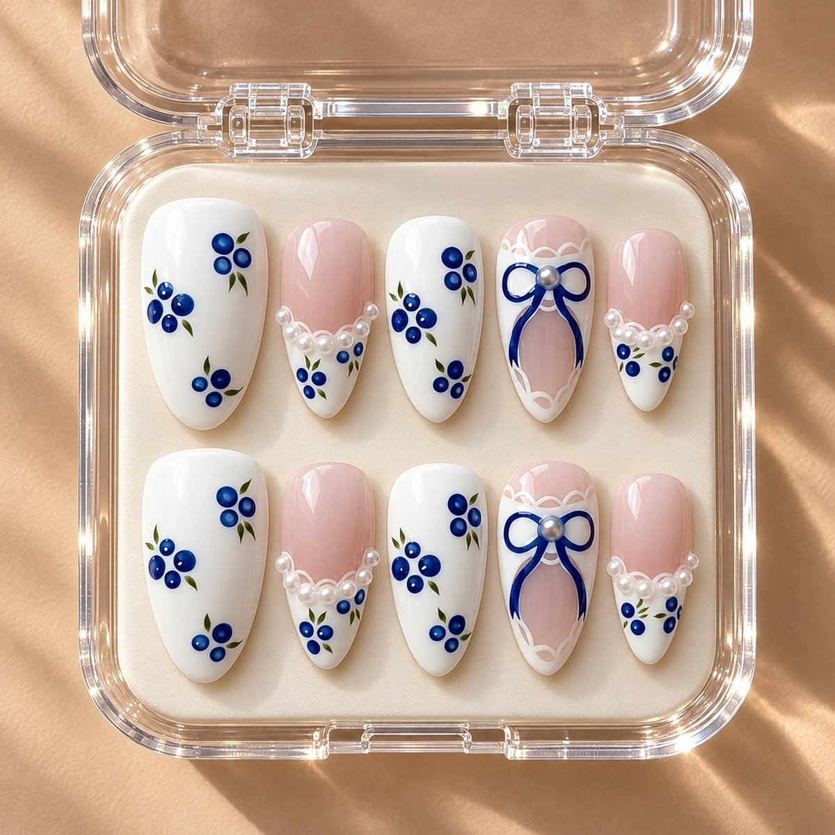 Blueberry and Pearl Bow Press On Nails with Lace Details in clear acrylic storage box