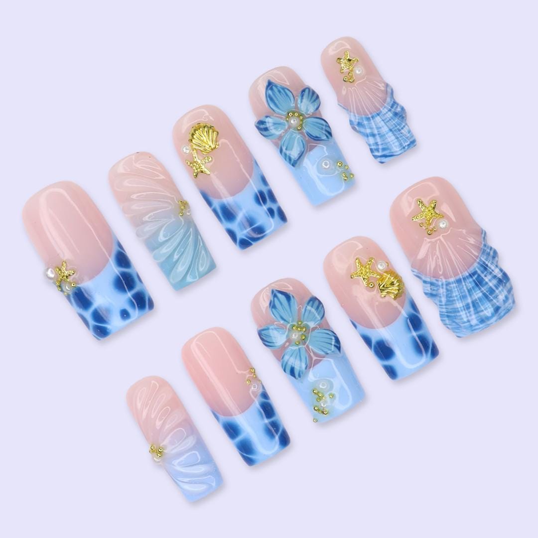 Blush Pink and Blue Ocean Nails with Tropical Flowers, Shells and Gold Charms