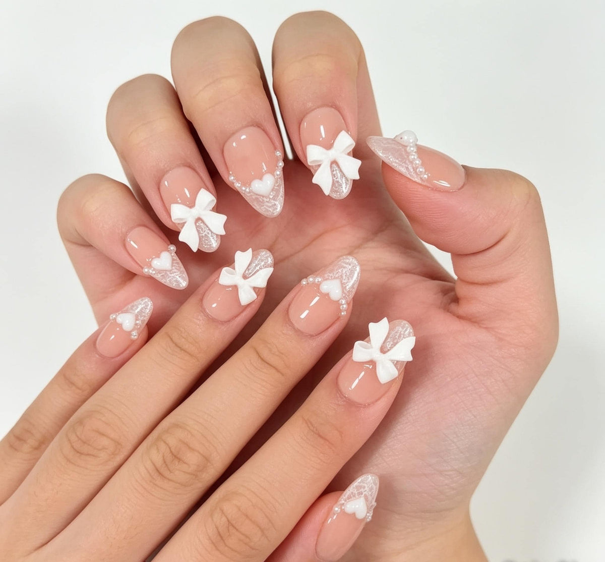 Blush Pink Bridal Lace French Tip Nails With Pearl Accents and 3D White Bows