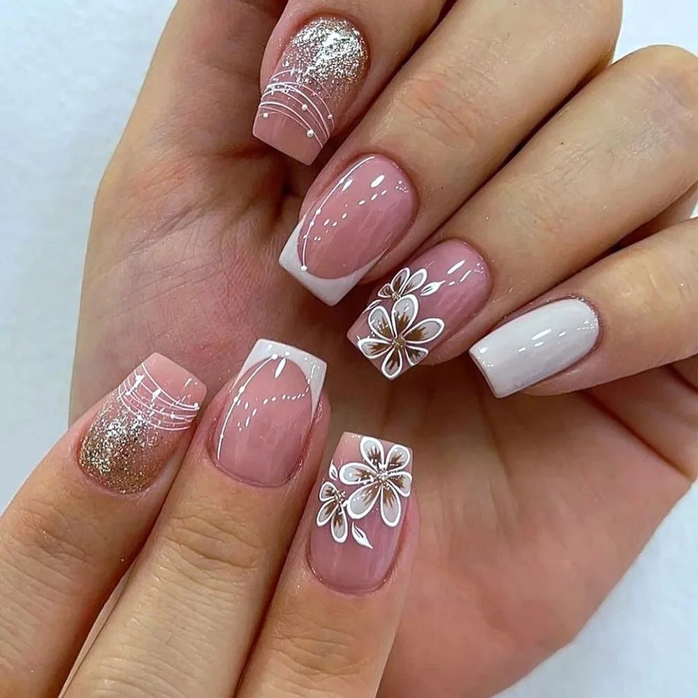 Blush Pink French Tip Nails with White Floral Art and Silver Glitter