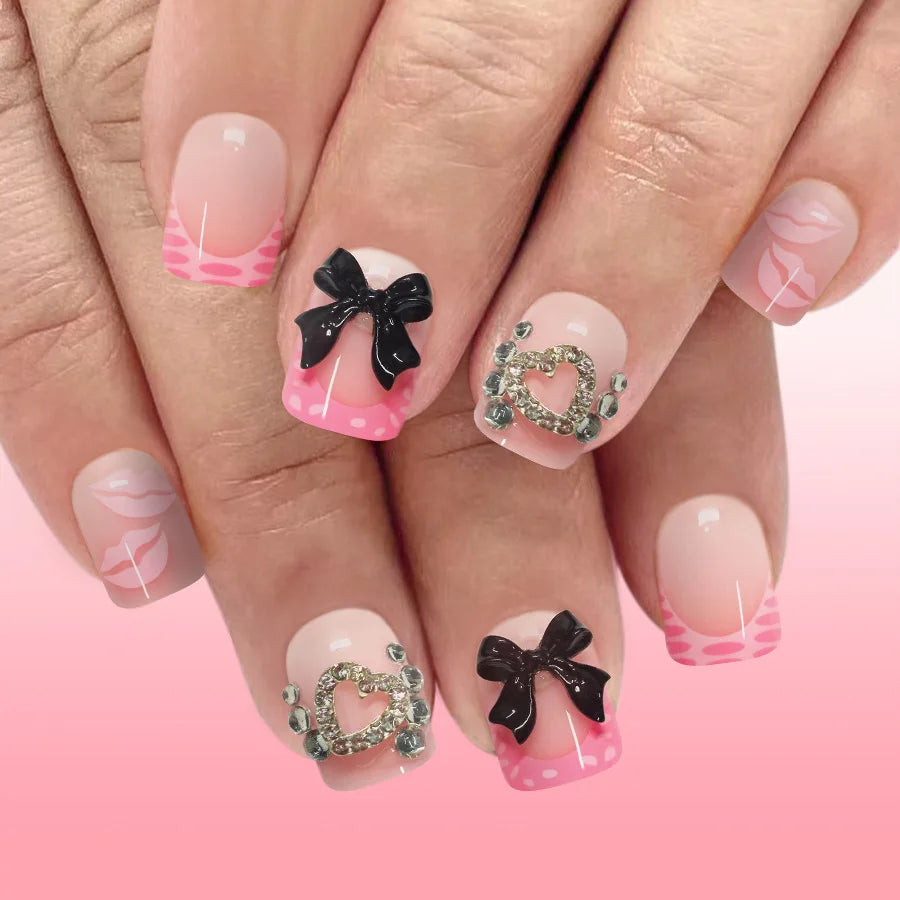 Blush Pink French Tip Press On Nails with Black Bows and Rhinestone Hearts