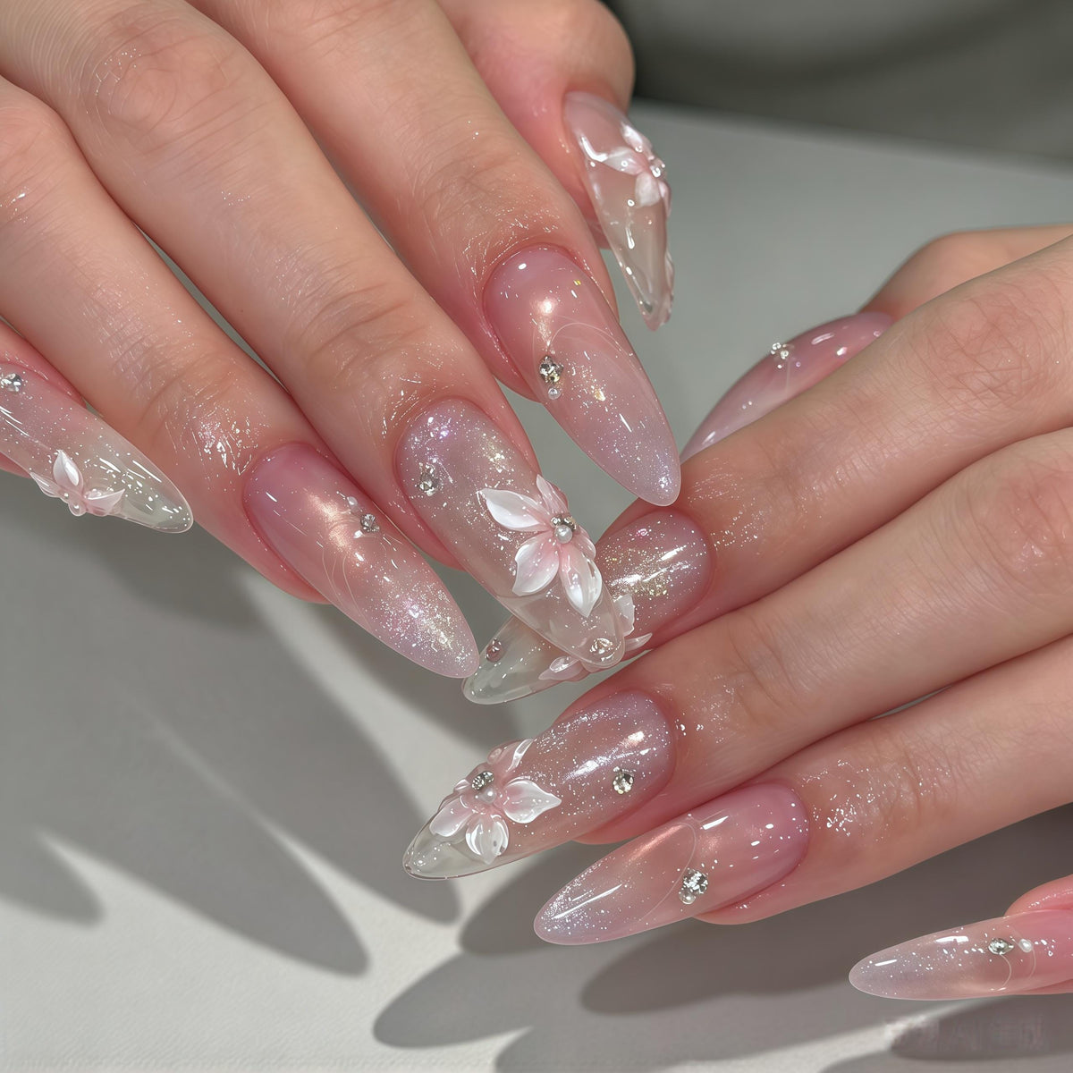 Blush Pink Gradient Nails With 3D White Flowers, Rhinestones & Iridescent Glitter