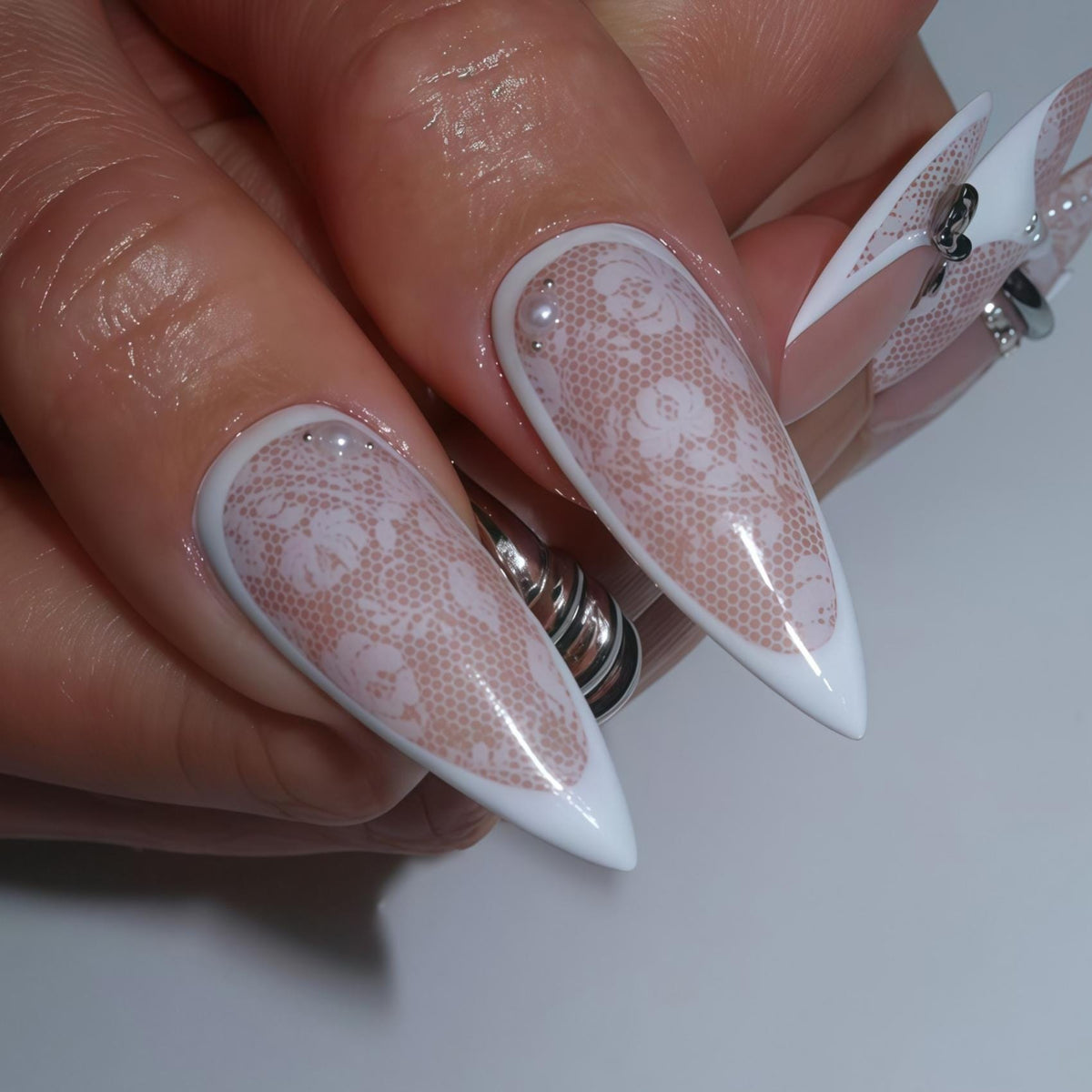 Blush Pink Lace French Tip Bridal Nails With Silver Bows and Rhinestones