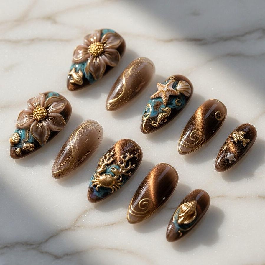 Brown and Bronze Cat Eye Ocean Nails with Raised Gold Sea Life Details