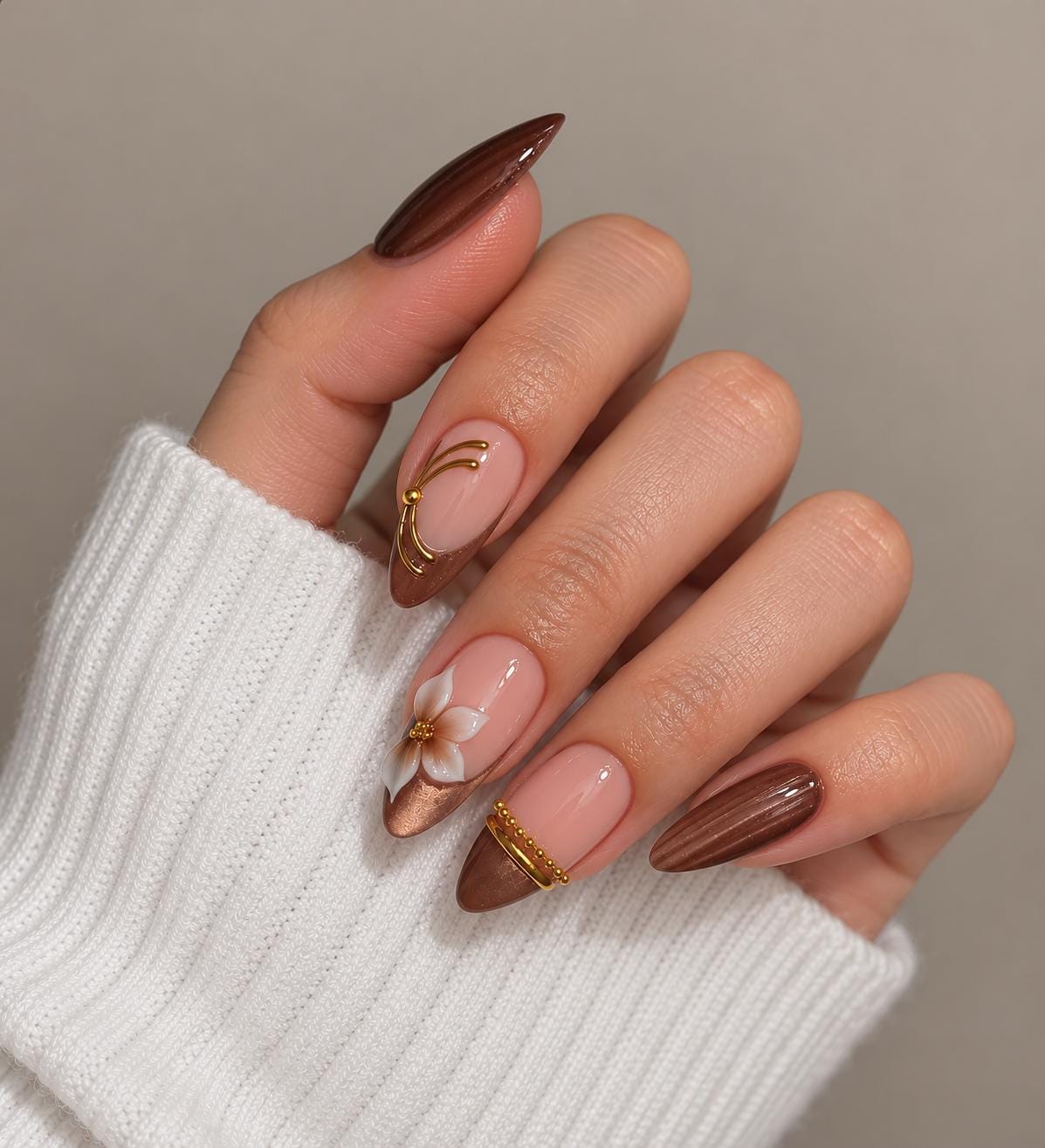 Brown Cat-Eye and Blush Floral Nails with Gold Metallic French Tips