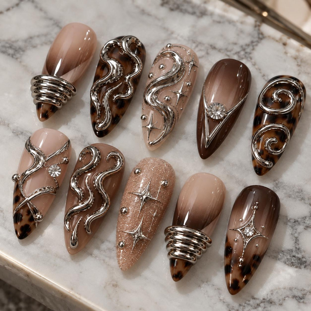 Brown Leopard Print Nails with Raised Silver Chrome Swirls and Rhinestones