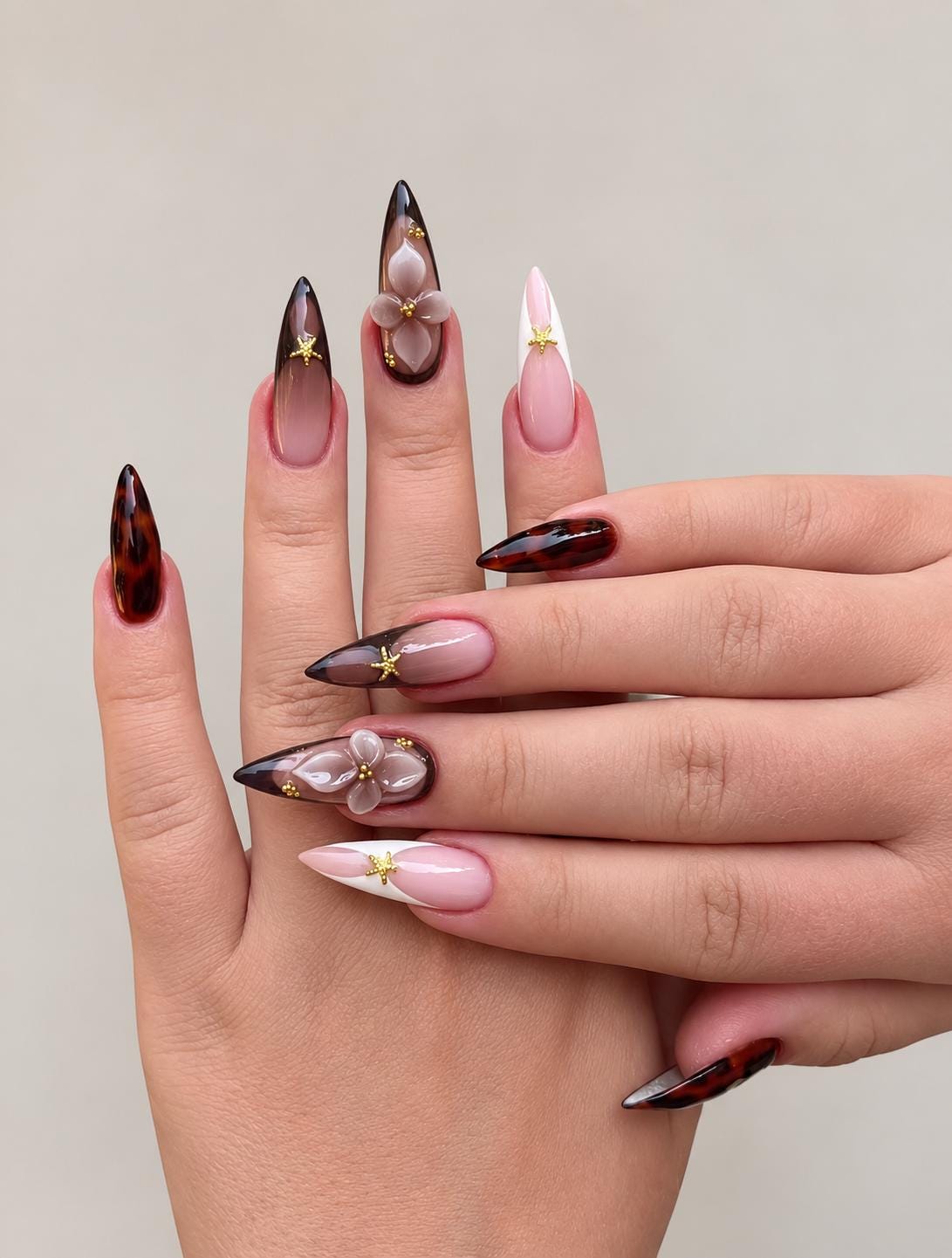 Brown Tortoiseshell French Tip Nails With 3D Flowers and Gold Stars
