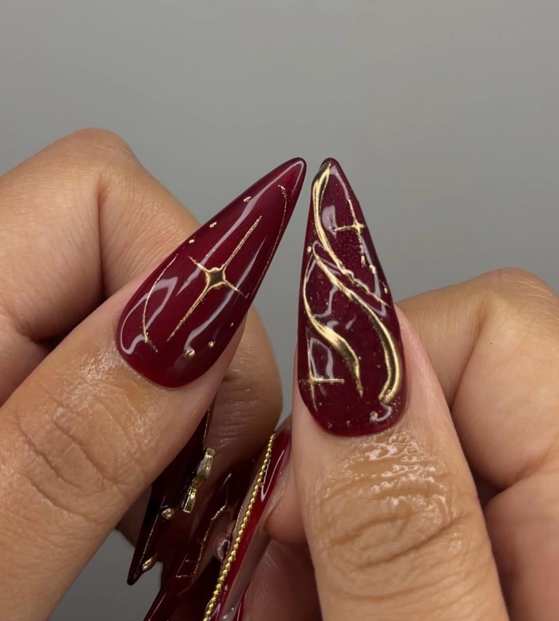 Burgundy and Blush Pink Nails with Gold Bows, Beaded Borders and Starbursts