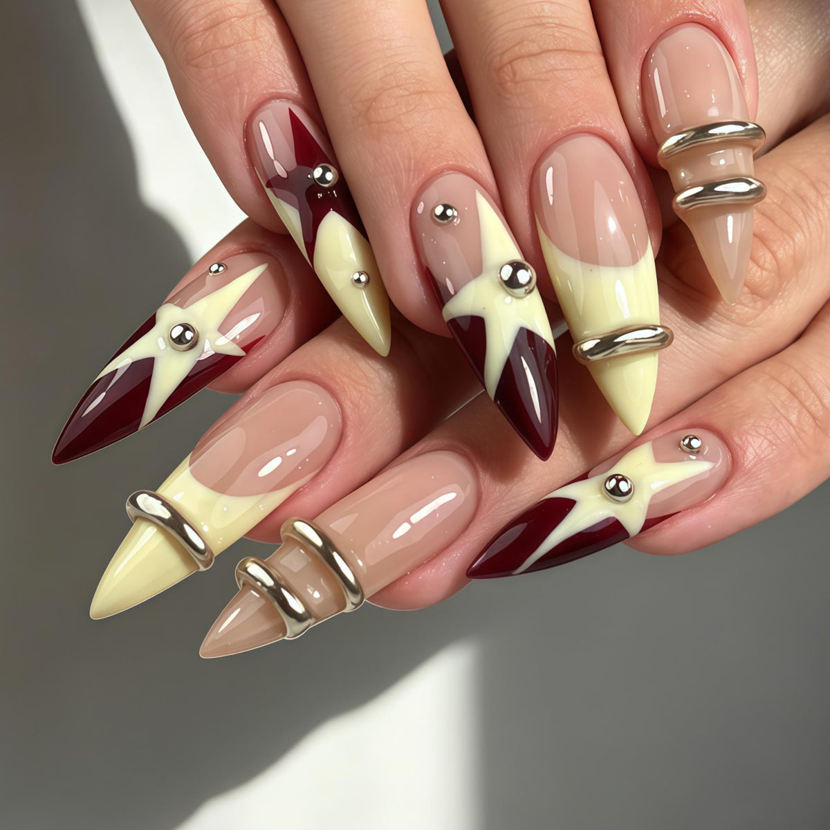 Burgundy and Butter Yellow Starburst Nail Set with Silver Rings