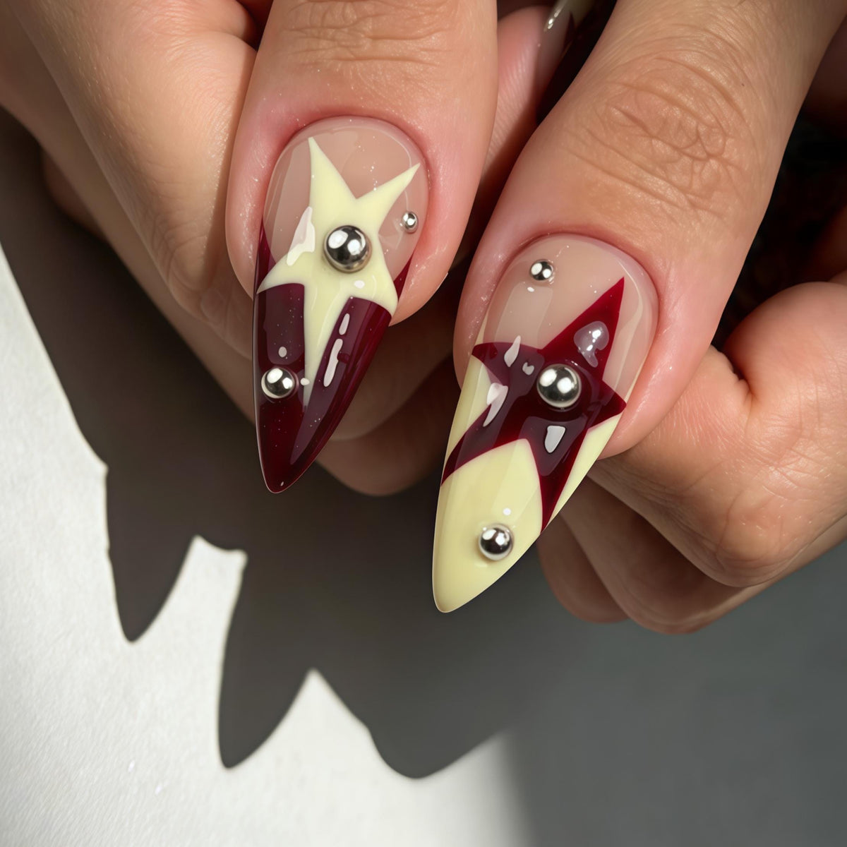 Burgundy and Butter Yellow Starburst Nail Set with Silver Rings