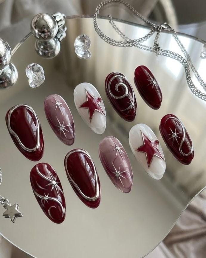Burgundy and Mauve Celestial Star Nail Set With Silver Swirls