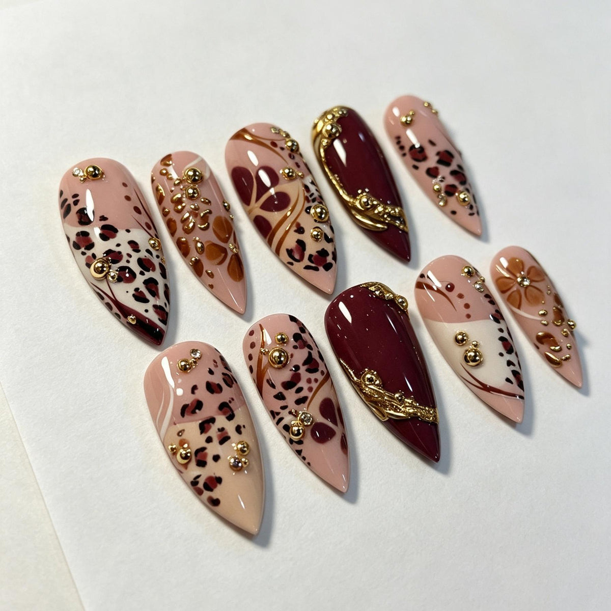 Burgundy and Nude Leopard Print Nail Set With Gold Bead Accents