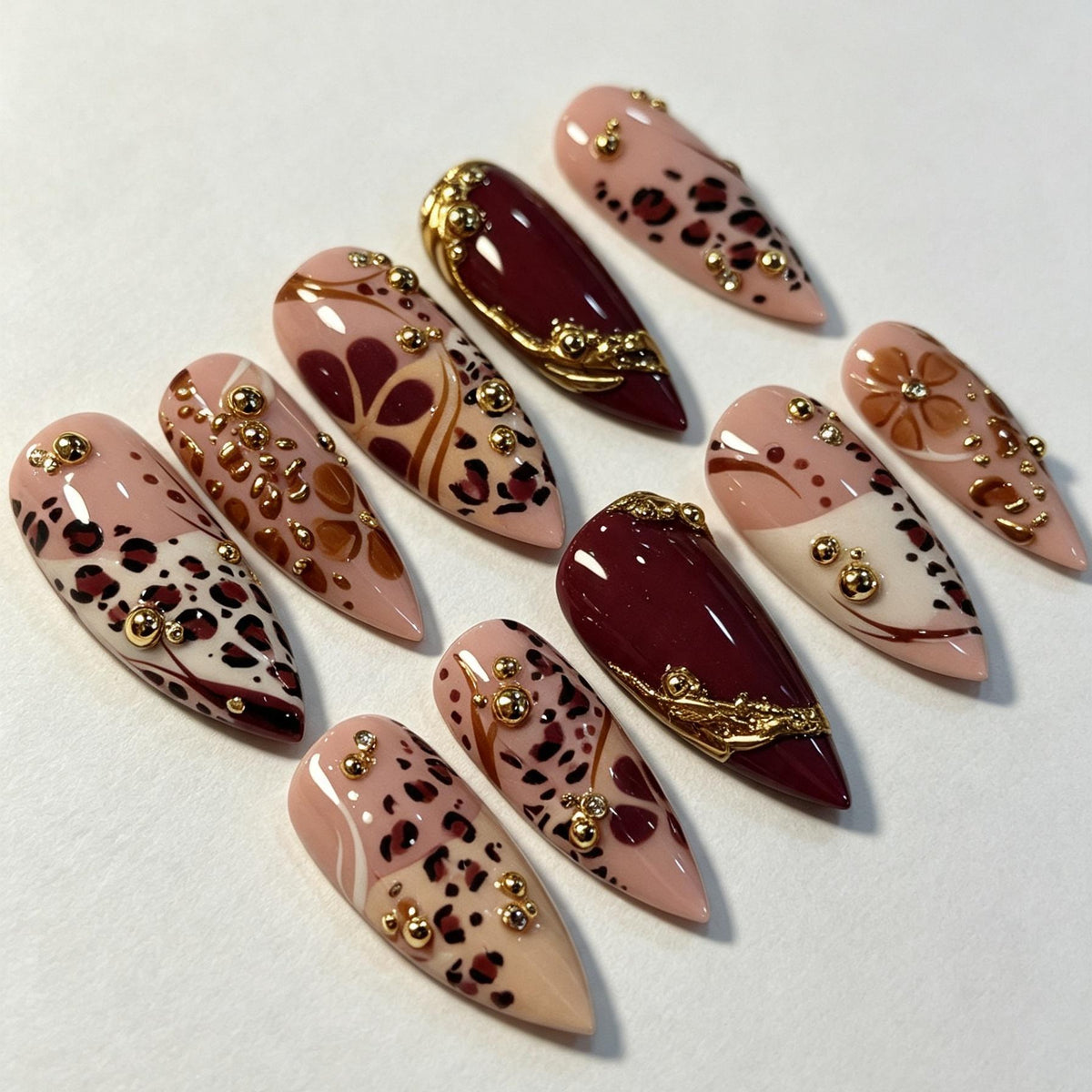 Burgundy and Nude Leopard Print Nail Set With Gold Bead Accents