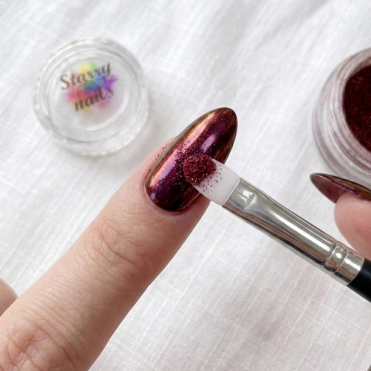 Burgundy Aurora Chrome Nail Powder With Garnet and Violet Shifts