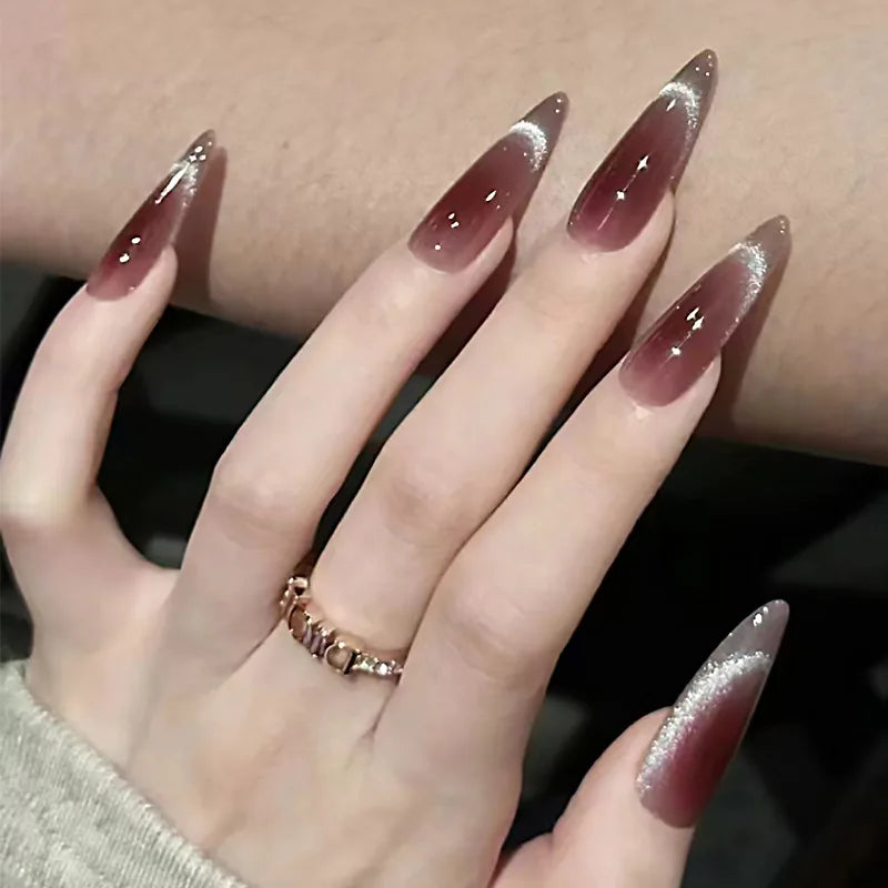 Burgundy Cat-Eye French Tip Nails with Silver Glitter and Floral Accents