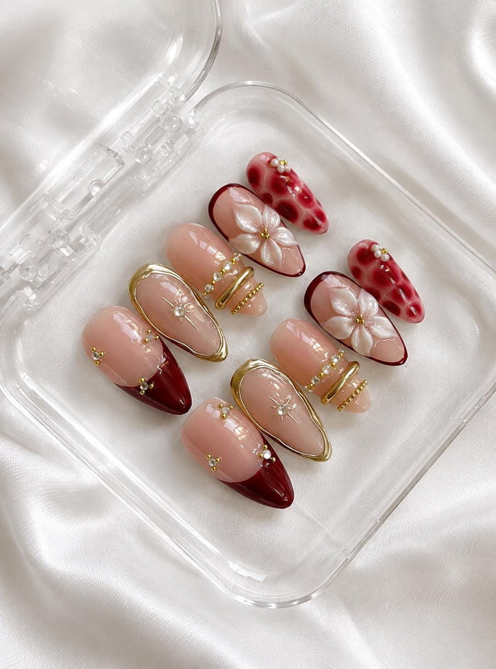 Burgundy French Tip Press On Nails With White Flowers and Gold Bangle Details