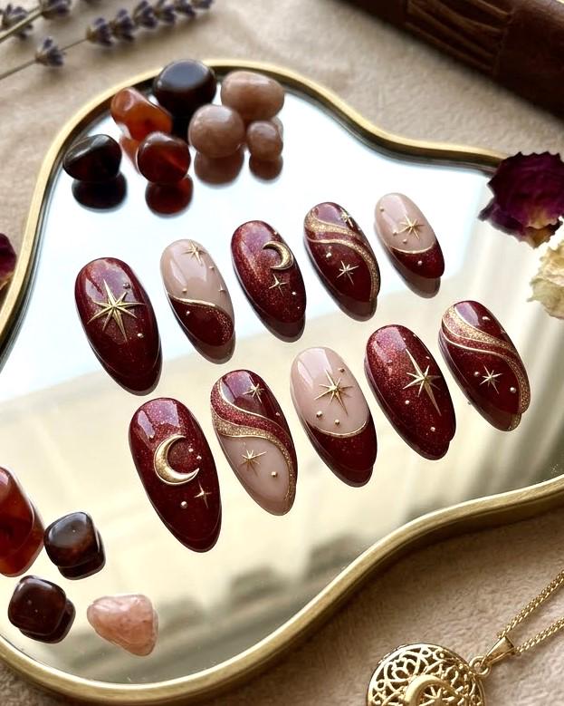 Burgundy Glitter Celestial Press-On Nails With Gold Moons and Stars