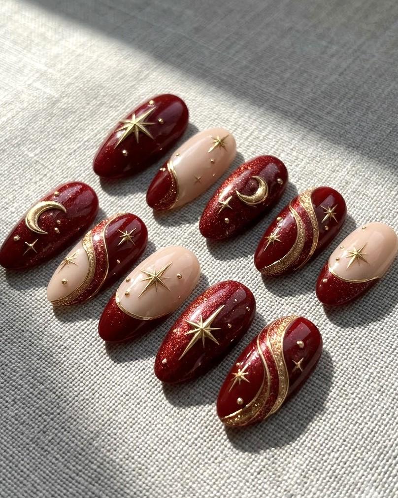 Burgundy Glitter Celestial Press-On Nails With Gold Moons and Stars