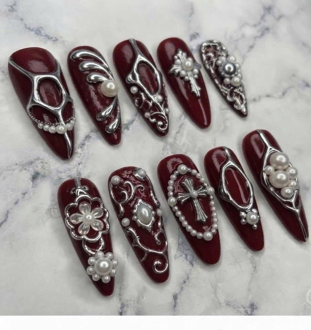 Burgundy Gothic Nails With Silver Scrollwork, Pearl Accents, Crosses and Flowers