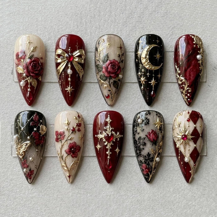 Burgundy Rose Gothic Press On Nail Set With Gold Bows, Pearls, and Celestial Details