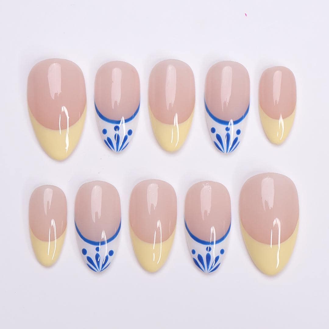 Butter Yellow French Tip Nails With Blue-Edged White Tips and Leaf Details