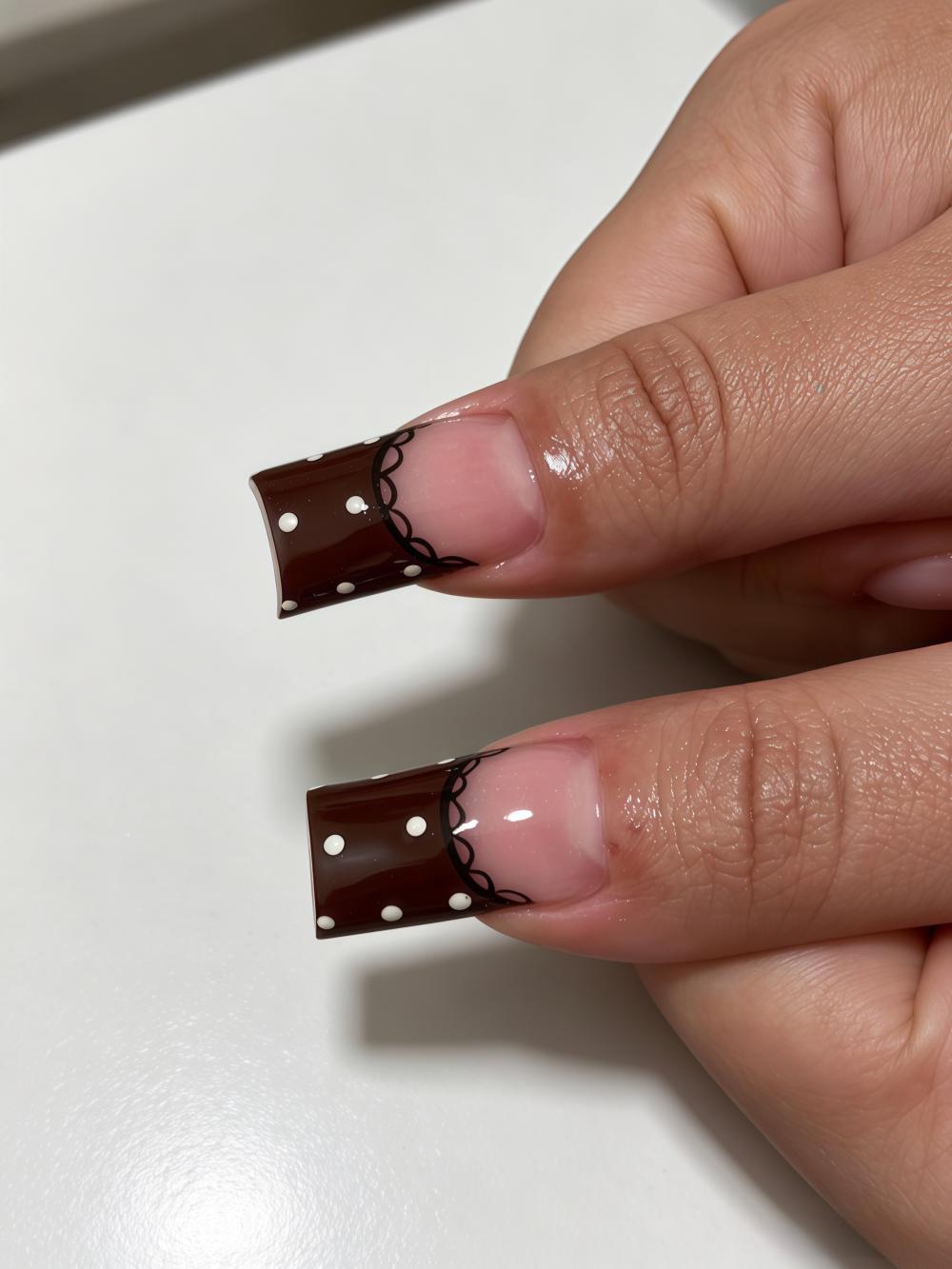 Chocolate and Ivory Polka Dot Nails with Orange Bead Accents
