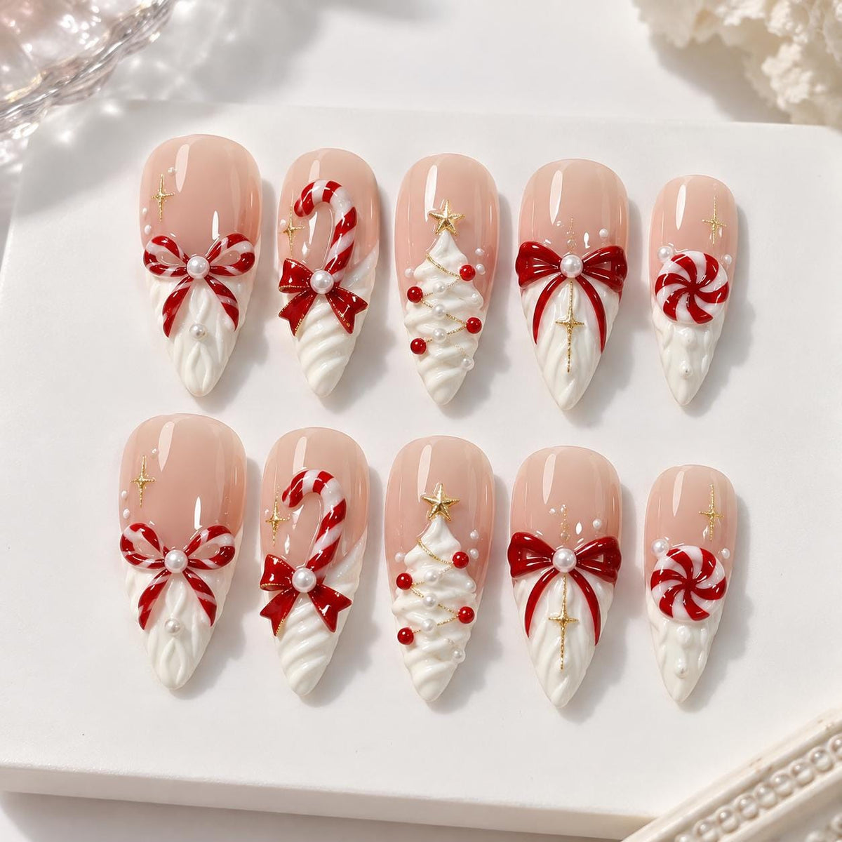 Christmas Candy Cane and Bow Nails with Pearls and Gold Star Details