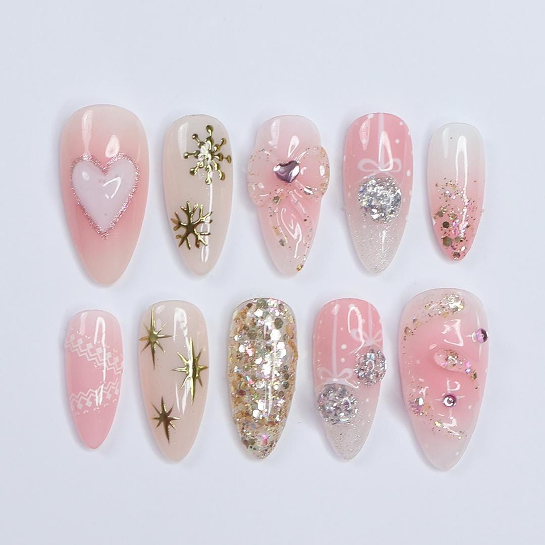 Christmas Pink Press-On Nails with Bows, Glitter, Hearts, and Gold Snowflakes