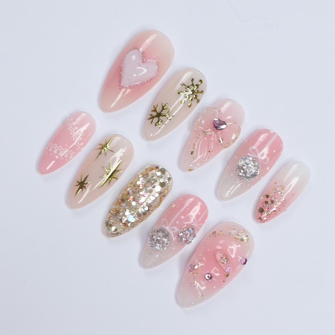 Christmas Pink Press-On Nails with Bows, Glitter, Hearts, and Gold Snowflakes