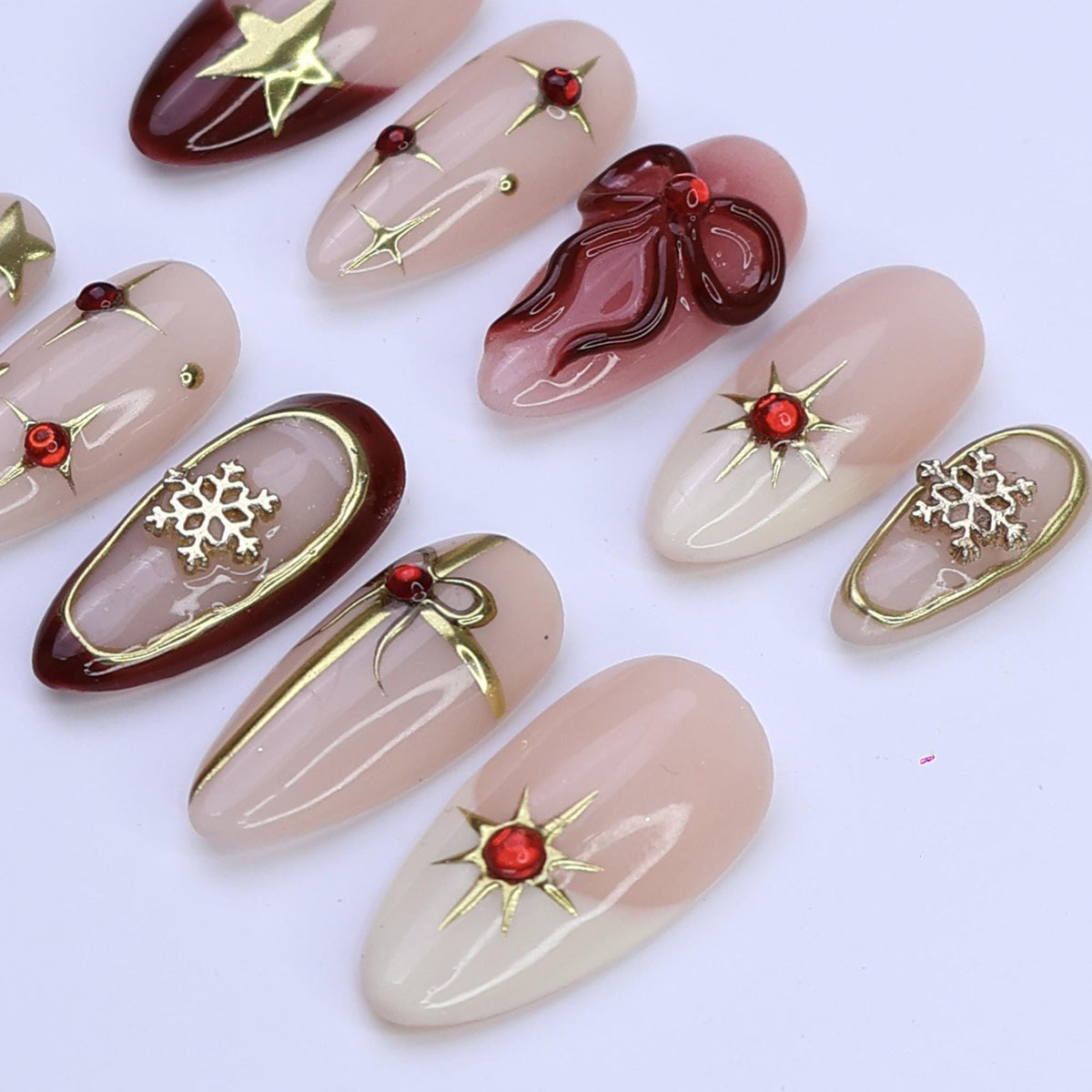 Christmas Press On Nails With Burgundy Bow, Gold Stars and Snowflakes