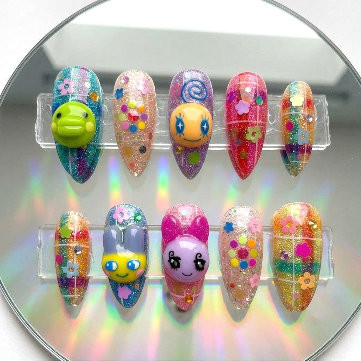 Colorful Kawaii Character Nails With Glitter, Flowers and Confetti Dots