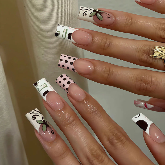 Cow Print Graphic French Tip Press On Nails With Black Dots and Green Swirls
