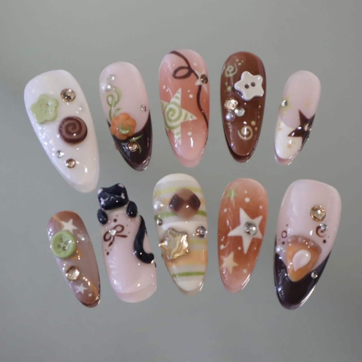 Cozy Café Cat Nail Set With Swirls, Stars, Button Charms and Rhinestones