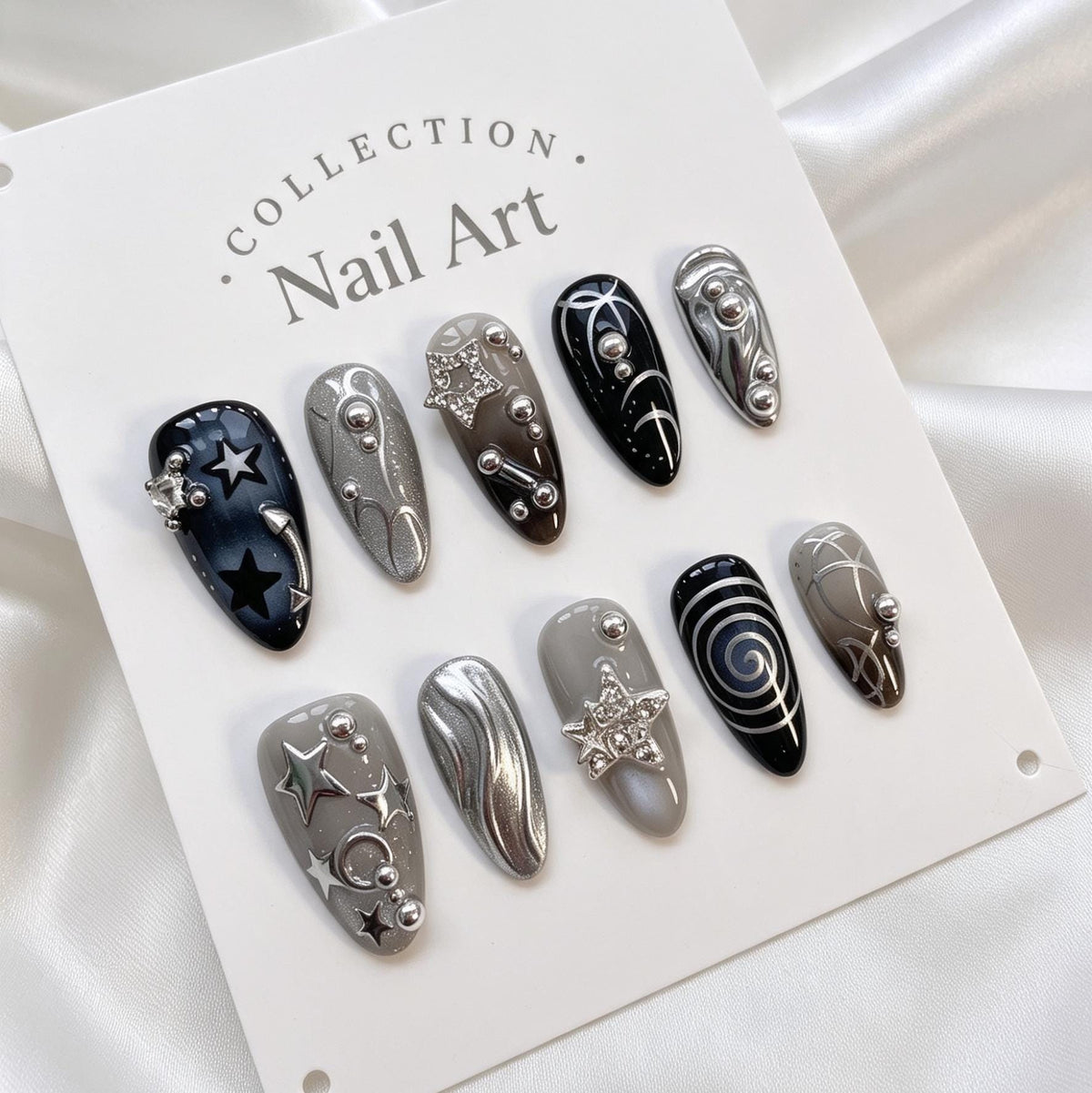 Dark Celestial Star and Moon Nails With Silver Chrome Swirls
