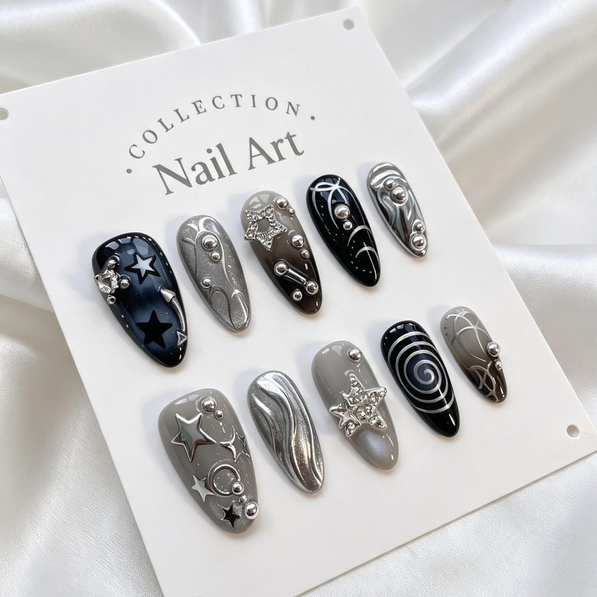 Dark Celestial Star and Moon Nails With Silver Chrome Swirls